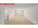 Large bedroom with neutral carpet and natural light at 11123 Cardinal Creek Ave, Charlotte, NC 28215