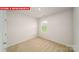 Cozy bedroom featuring neutral carpet, a window and white walls at 11123 Cardinal Creek Ave, Charlotte, NC 28215