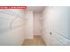 Walk-in closet with shelving and carpeted floor at 11123 Cardinal Creek Ave, Charlotte, NC 28215