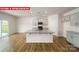The kitchen features modern appliances, a center island, and an open layout at 11123 Cardinal Creek Ave, Charlotte, NC 28215