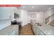 Spacious kitchen showcasing granite counters, stainless appliances, and modern lighting at 11123 Cardinal Creek Ave, Charlotte, NC 28215