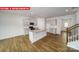 Spacious kitchen with an island, granite countertops, and modern stainless steel appliances at 11123 Cardinal Creek Ave, Charlotte, NC 28215