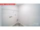 A convenient laundry hook-up room with tiled floors at 11123 Cardinal Creek Ave, Charlotte, NC 28215