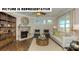 Inviting living room with fireplace, hardwood floors, and abundant natural light at 121 Noah Ln, Troutman, NC 28166