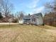 Charming single-Gathering home featuring a well-maintained lawn and a welcoming front porch, perfect for enjoying the outdoors at 121 Purple Finch Ln, Mooresville, NC 28117
