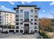 Elegant condo building features modern design, large windows, and private balconies with scenic street views at 19329 Watermark Dr # 551/552, Cornelius, NC 28031