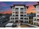 Stunning condo building boasts a contemporary design with expansive balconies perfect for enjoying outdoor living at 19329 Watermark Dr # 551/552, Cornelius, NC 28031