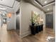 Stylish lobby with modern artwork, sleek elevator access, and elegant lighting for a welcoming ambiance at 19329 Watermark Dr # 551/552, Cornelius, NC 28031
