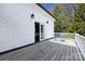 Outdoor deck with blue chairs offering a nice view of surrounding greenery at 2109 Wellesley Ave, Charlotte, NC 28207