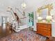 Spacious foyer with hardwood floors, staircase and a view of multiple rooms at 2109 Wellesley Ave, Charlotte, NC 28207