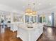 Bright and airy kitchen featuring a large center island, marble countertops, and hardwood flooring at 2109 Wellesley Ave, Charlotte, NC 28207