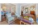 Open-concept living area with a view of dining room and staircase at 2109 Wellesley Ave, Charlotte, NC 28207