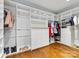 Well-organized walk-in closet featuring custom shelving and ample storage space for clothing and shoes at 2109 Wellesley Ave, Charlotte, NC 28207