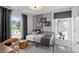 Cozy bedroom with natural light, a comfortable bed, and stylish decor at 2232 Cobble Ct # 153, Monroe, NC 28110