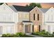 Charming brick townhome with a well-manicured lawn and inviting entrance at 2236 Cobble Ct # 151, Monroe, NC 28110