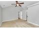 Bedroom featuring a large window, vaulted ceiling and neutral carpeting at 2321 Heathershire Ln, Matthews, NC 28105