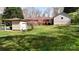 Backyard view of home and covered patio area at 2360 Kings Grant Rd, Lincolnton, NC 28092