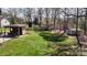 Backyard view of a shed and wooded area at 2360 Kings Grant Rd, Lincolnton, NC 28092