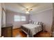 Charming bedroom with hardwood floors, ceiling fan, and a cozy atmosphere at 2360 Kings Grant Rd, Lincolnton, NC 28092