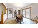 Charming dining area with a chandelier and french doors at 2360 Kings Grant Rd, Lincolnton, NC 28092