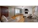 Spacious living room features a fireplace, hardwood floors, and bright windows at 2360 Kings Grant Rd, Lincolnton, NC 28092
