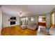 The cozy living room features hardwood floors and fireplace at 2360 Kings Grant Rd, Lincolnton, NC 28092