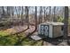 View of shed in wooded back yard at 2360 Kings Grant Rd, Lincolnton, NC 28092
