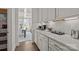 Butler's pantry with modern cabinets and countertops offering additional storage and serving space at 281 Supernova Dr, York, SC 29745
