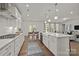 Well-appointed kitchen with modern appliances and seamless flow into the dining and living areas at 281 Supernova Dr, York, SC 29745