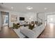 Bright living room with hardwood floors, comfortable seating, and contemporary decor at 281 Supernova Dr, York, SC 29745