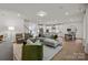 Open-concept floor plan featuring a living room, dining room and a modern kitchen at 281 Supernova Dr, York, SC 29745