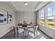 Bright office featuring panelled walls, a desk, seating and a large window at 281 Supernova Dr, York, SC 29745