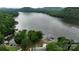 Aerial view of Lake Tillery with docks and boats and lush green trees, a boater's paradise at 339 Pine Lake Dr # 760, Troy, NC 27371