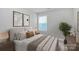 Cozy bedroom with a plush bed, natural lighting, and calming decor for a peaceful night's sleep at 404 Brannon Meadows Dr # 270, York, SC 29745