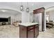 Modern kitchen with stainless steel refrigerator, island, and stylish pendant lighting at 404 Brannon Meadows Dr # 270, York, SC 29745