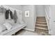 Inviting mudroom with coat hooks, bench seating, and stylish decor welcomes you home at 404 Brannon Meadows Dr # 270, York, SC 29745
