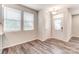 Entryway filled with natural light and wood-look flooring at 4102 Cheyney Park Dr, Charlotte, NC 28269
