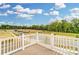 Beautiful backyard view from the back deck with the sky in the background at 4118 Cheyney Park Dr, Charlotte, NC 28269