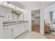 Bathroom featuring a double vanity with stone countertops, mirrors, and walk-in closet at 4790 Formation Ct # 67, Lancaster, SC 29720