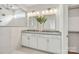 Modern bathroom featuring a double vanity, stone countertops, and tiled shower with a glass enclosure at 4790 Formation Ct # 67, Lancaster, SC 29720