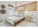 Stylishly furnished bedroom featuring a modern platform bed, sleek side table, and contemporary decor at 4790 Formation Ct # 67, Lancaster, SC 29720