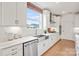 Bright kitchen featuring white cabinets, stainless steel appliances, and an eat-in counter at 4790 Formation Ct # 67, Lancaster, SC 29720