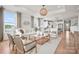 Open-concept living space with views to the kitchen, great lighting, and modern decor at 4790 Formation Ct # 67, Lancaster, SC 29720