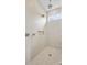 Elegant tiled shower with dual shower heads and a window, offering a luxurious bathing experience at 4790 Formation Ct # 67, Lancaster, SC 29720