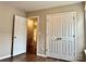 Bedroom with closet, hardwood floors, base molding, and ample natural light at 4809 Canipe Dr, Charlotte, NC 28269
