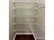 Spacious closet with shelving units and dark hardwood floors at 4809 Canipe Dr, Charlotte, NC 28269