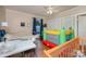 Bedroom with neutral walls, natural light, and an inflatable bouncy house at 517 Stockton St, Statesville, NC 28677