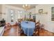 A formal dining room featuring a large table and a vintage chandelier at 517 Stockton St, Statesville, NC 28677