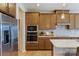 Modern kitchen with stainless steel appliances and abundant cabinet space at 5911 Wetlands Aly, Charlotte, NC 28215