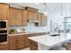 Modern kitchen featuring stainless appliances, tile backsplash, and sleek countertops at 5911 Wetlands Aly, Charlotte, NC 28215